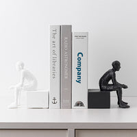 Serre livre statue homme assis