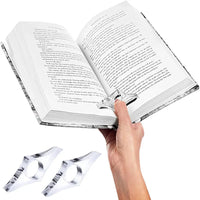 Bague de lecture en acrylique transparente utilisée pour maintenir un livre ouvert