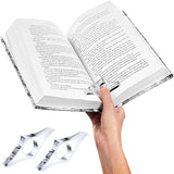 Bague de lecture en acrylique transparente utilisée pour maintenir un livre ouvert